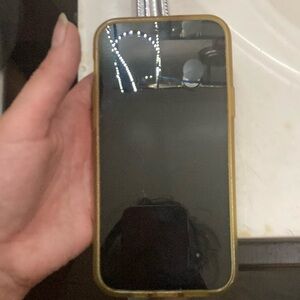 Apple Gold and Black Cell Phone with Sleek Design